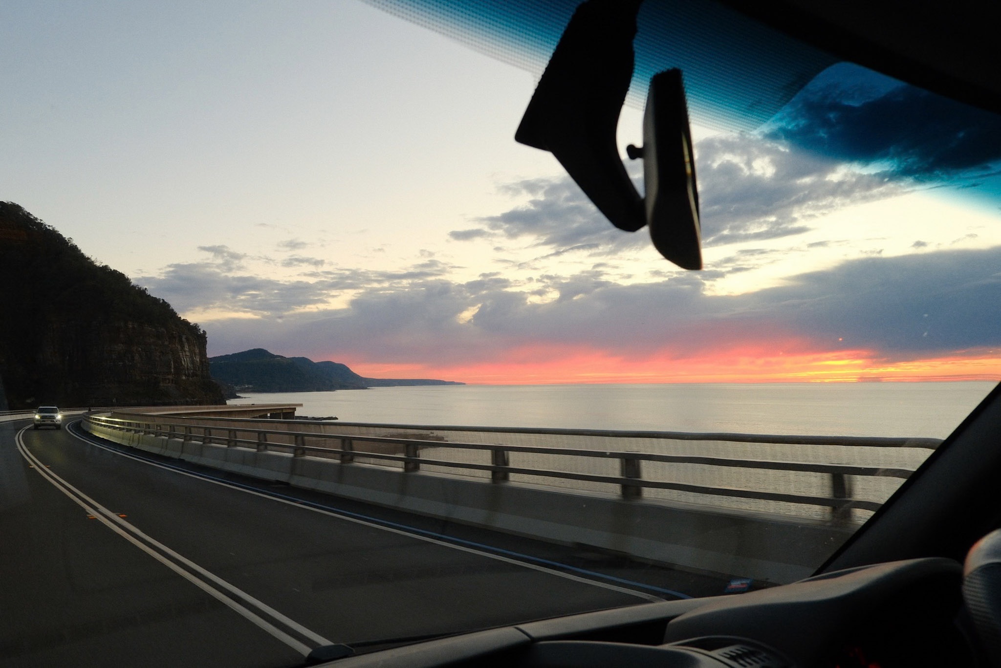 Sunset over the ocean from the Sea Cliff Bridge