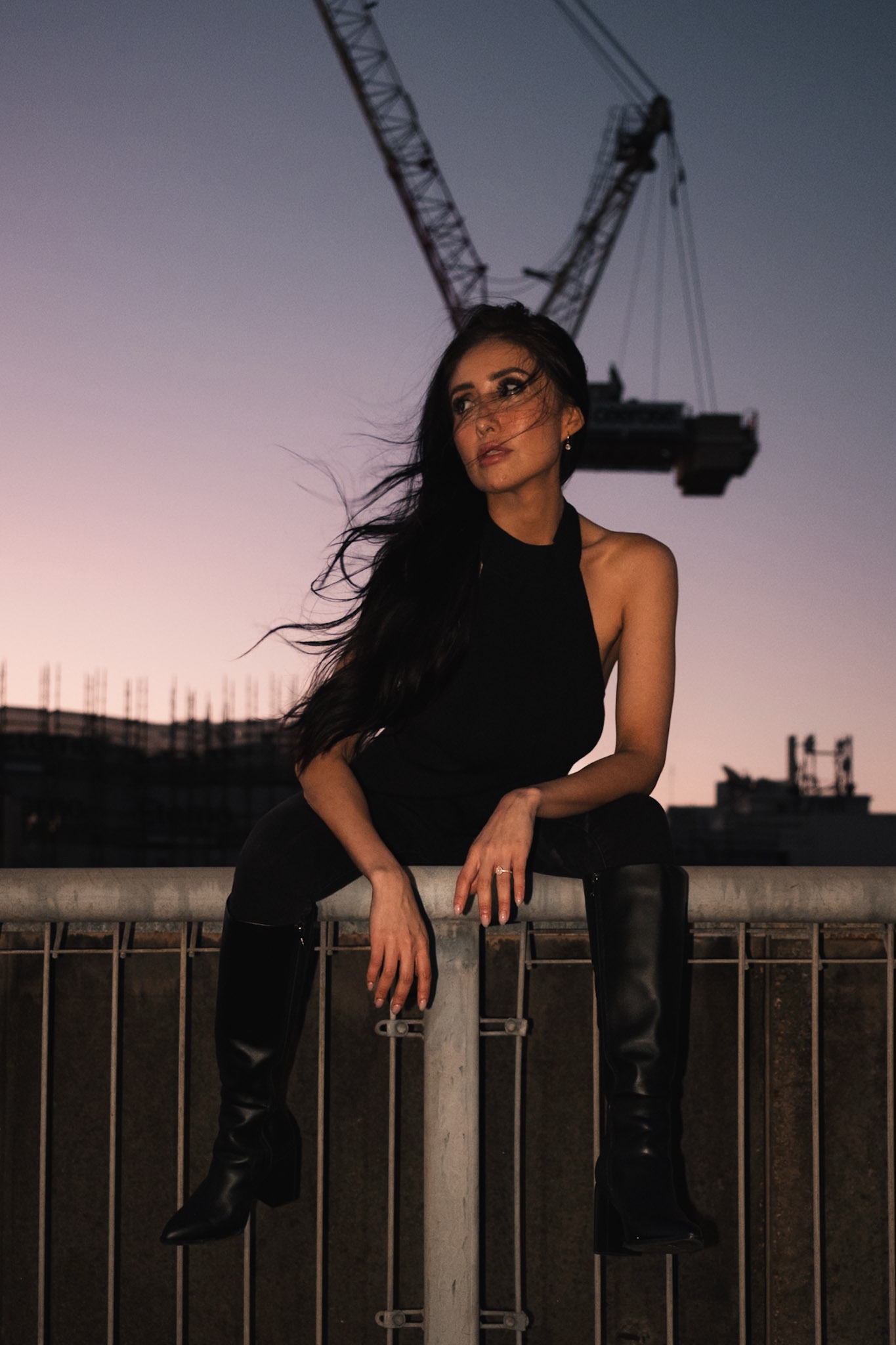 An editorial rooftop portrait at sunset on an Eastern Suburbs car park roof
