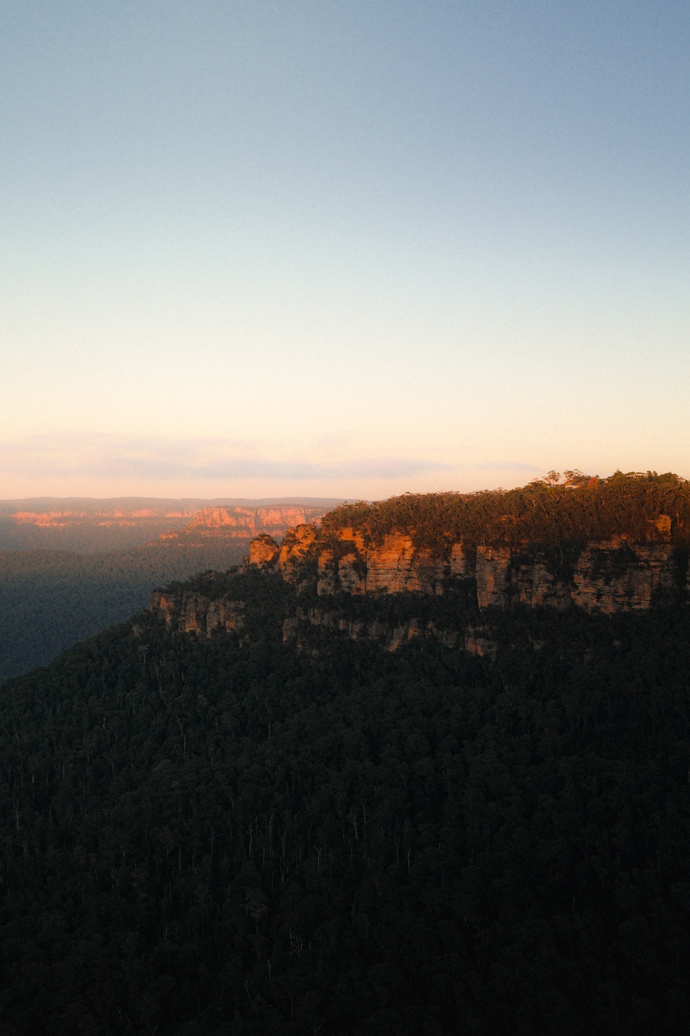 Layered ridgelines at sunset from Elysian Rock Lookout